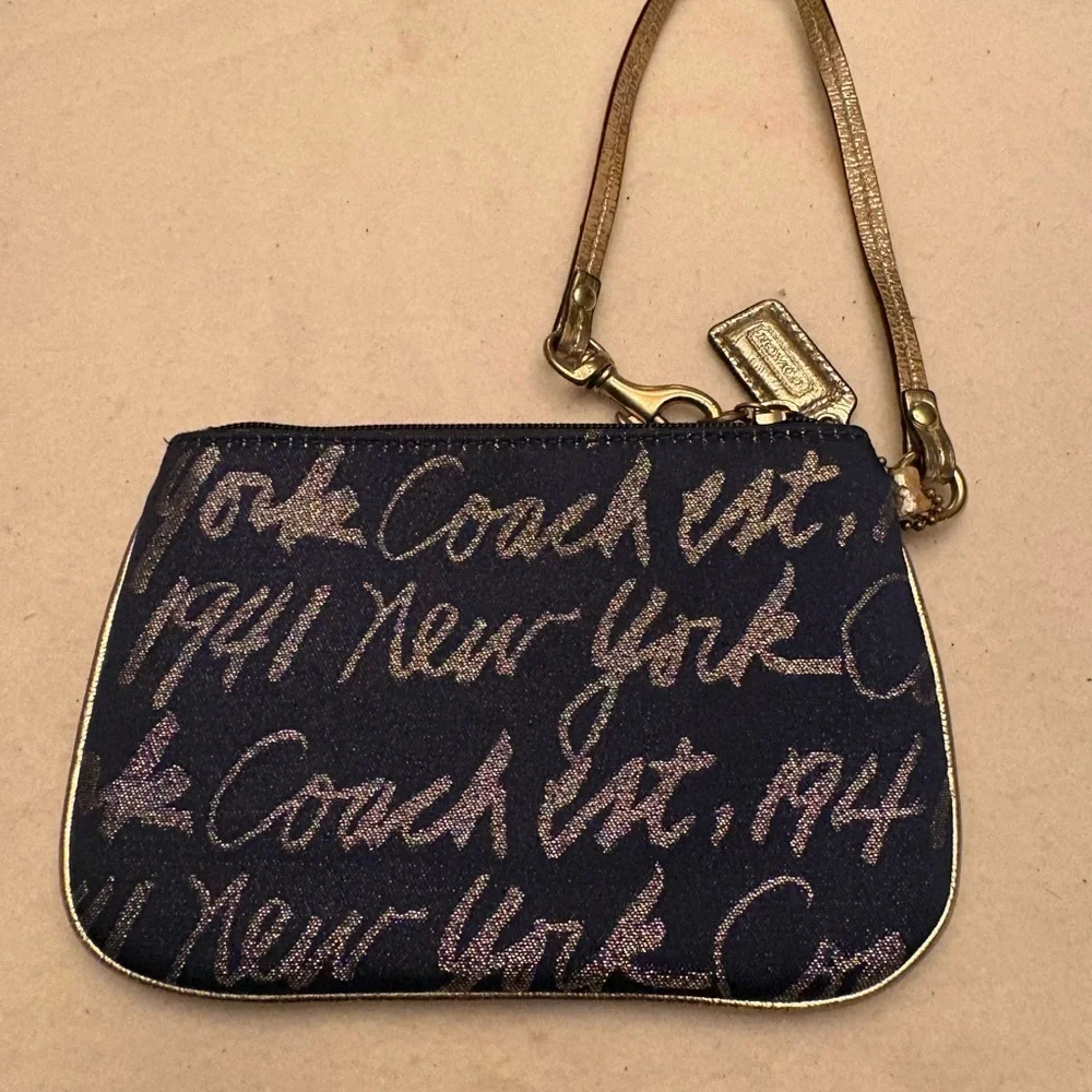 Coach Script New York Metallic Gold and Patent Leather Wristlet